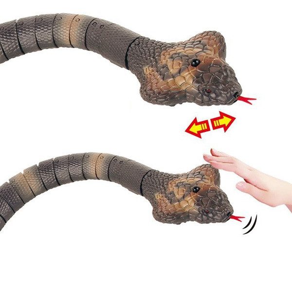 Іграшкова змія на радіокеруванні (сенсорна кобра, пульт яйце) 8809 - 5